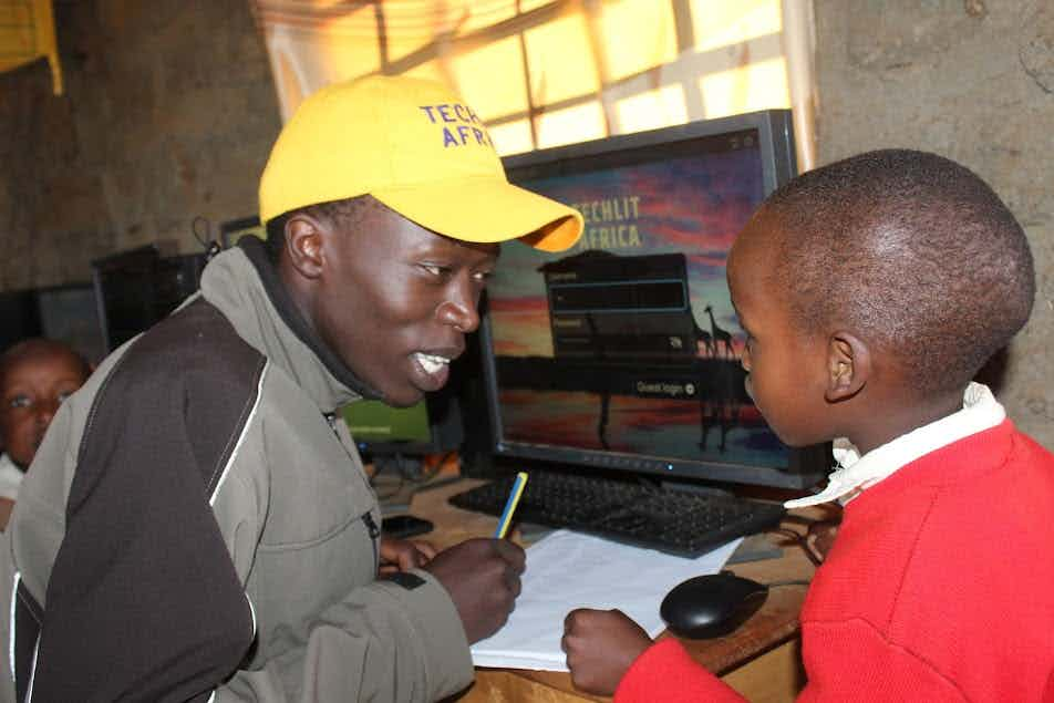 Allan Kiprono teaching students in a TechLit classroom