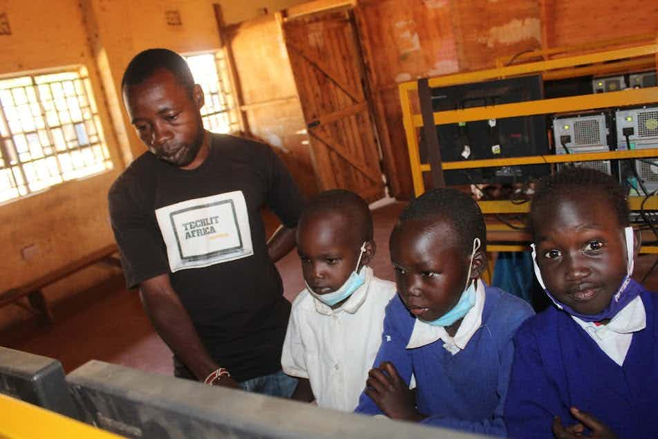 Computer Classes Denis Marega Teaching Students