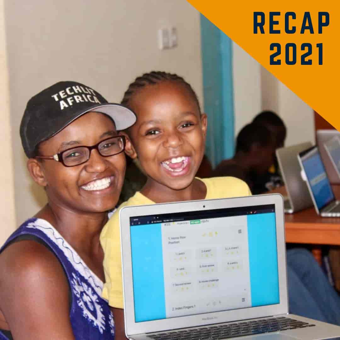 Nelly Cheboi sharing technology with young student
